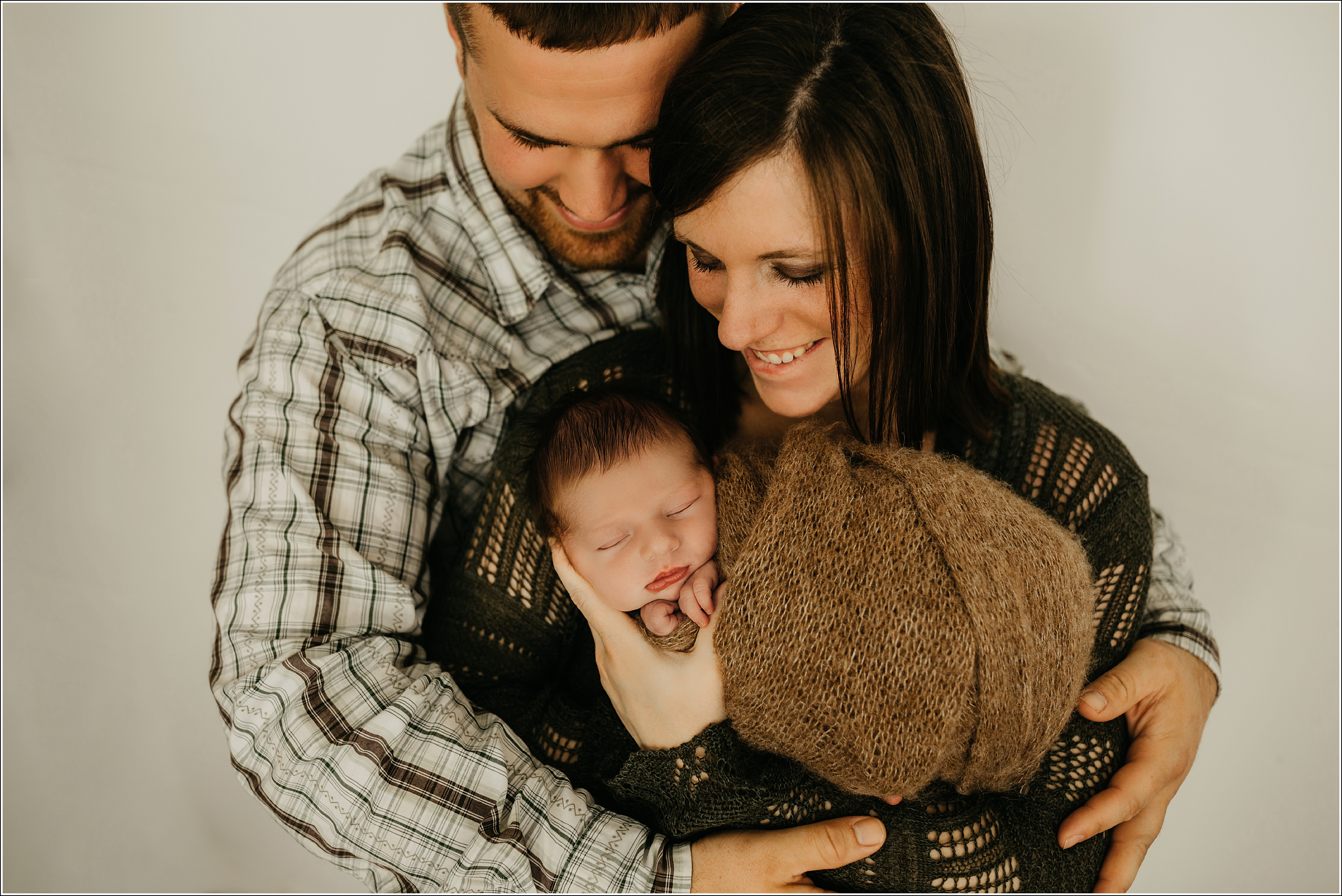 Family portrait with newborn photographer LaCrosse, WI wrapped newborn precious newborn family photo